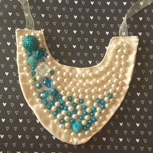 Pearl and blue bib